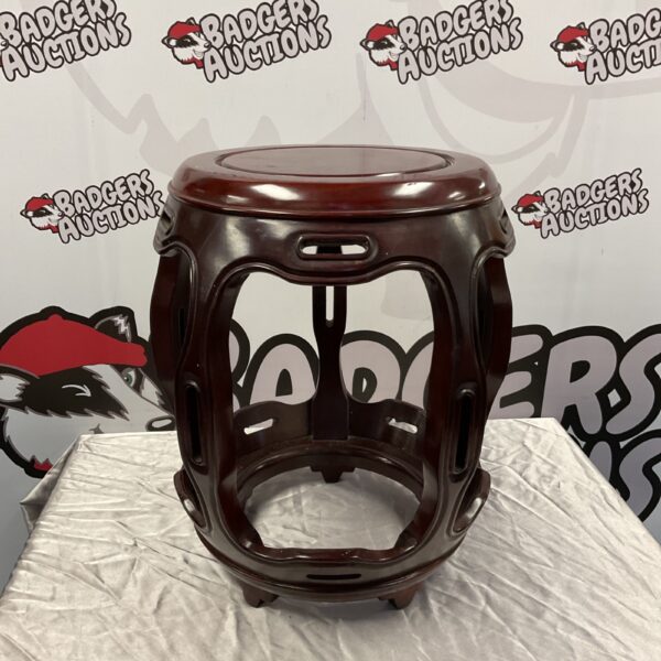 Vintage Chinese barrel stool with dark wood finish.