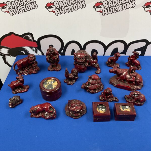 Collection of Chinese resin animal statues including Foo Dog, tiger and turtle.
