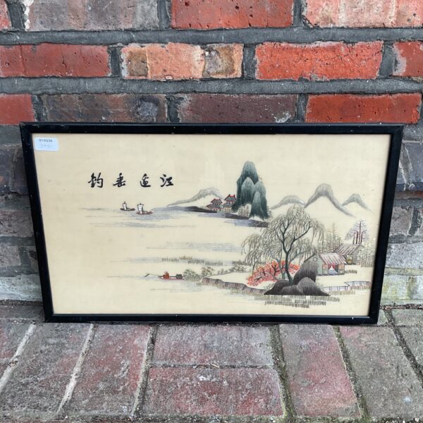 Vintage Chinese silk embroidery of a fisherman and mountain landscape.