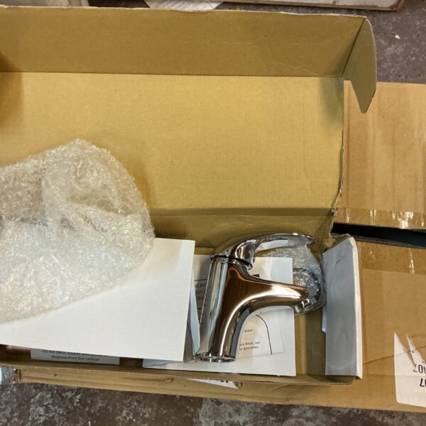 Chrome bathroom mixer tap presented as-found, ideal for renovation.
