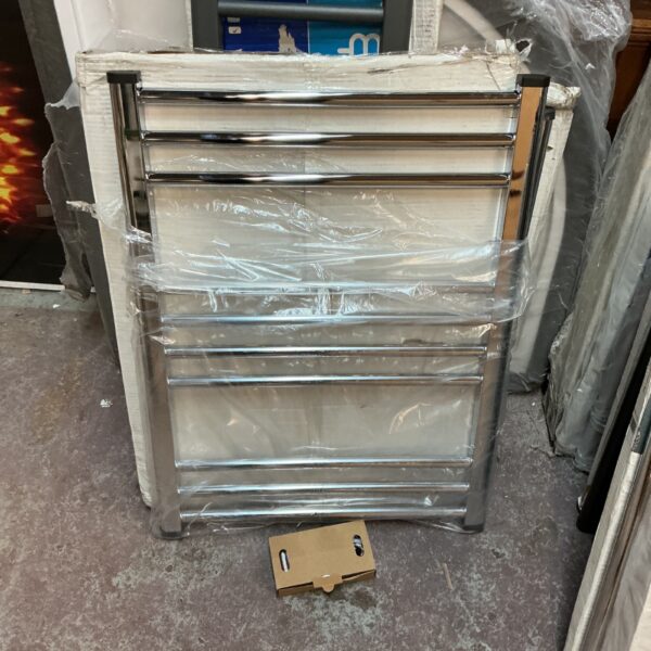 Chrome ladder radiator with fittings, ready for installation.
