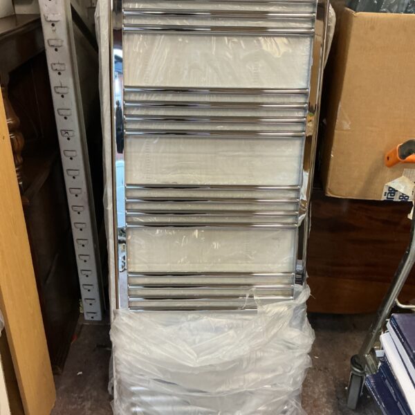 Tall chrome ladder radiator by Trade Taps in unrestored condition.