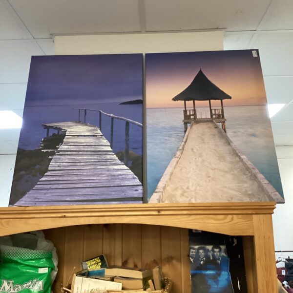 Large coastal canvas print depicting a wooden walkway and ocean view.