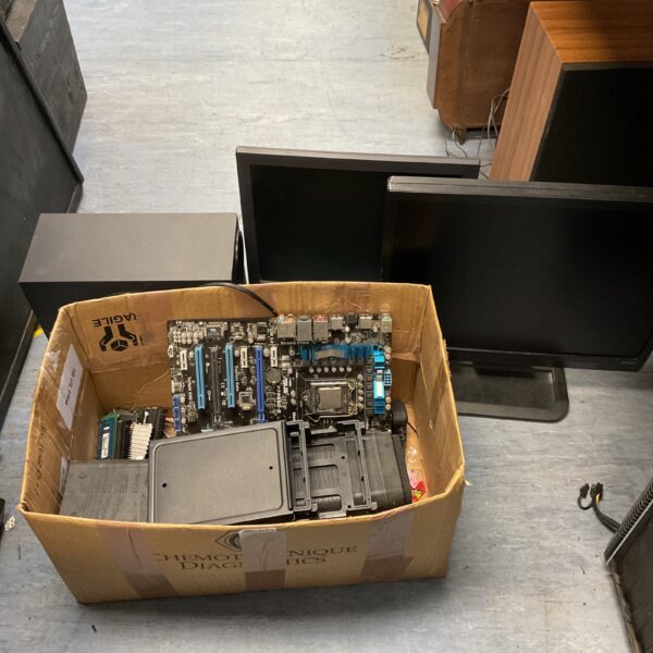 Mixed lot of computer components including motherboard and screens.