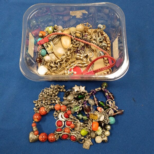Mixed lot of colourful costume jewellery bracelets for fashion or collecting.