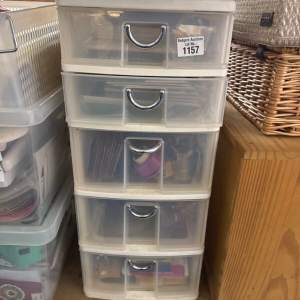 Clear plastic craft organiser stack with drawers.