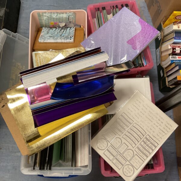 Large assortment of colourful craft paper for various projects.