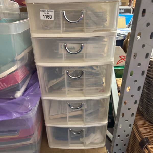 Clear plastic craft storage organiser with five drawers.