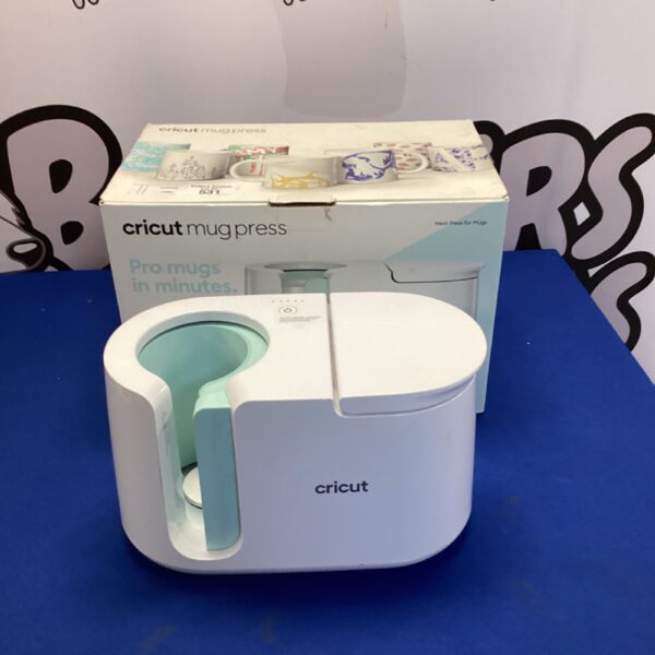 Cricut mug press in its original packaging, ready for crafting.