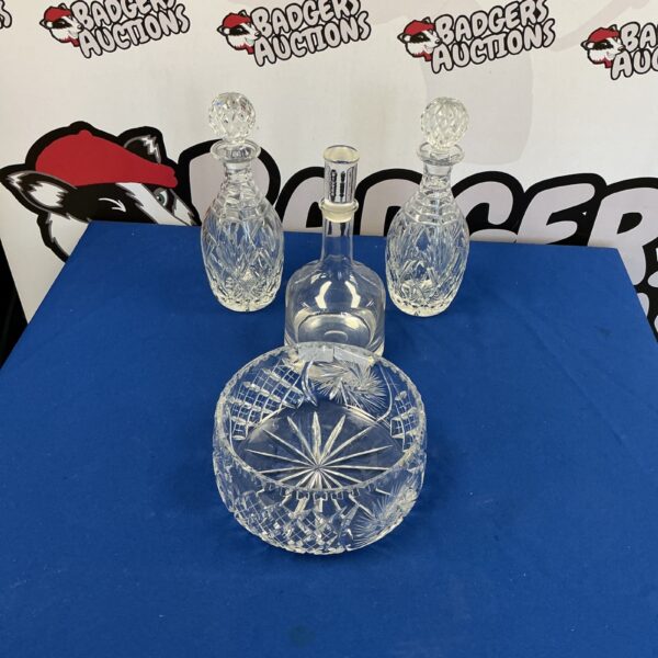 Elegant vintage crystal decanter set with glasses.