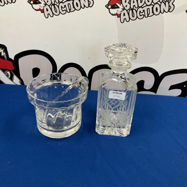 Vintage cut glass decanter set with ice bucket, elegant barware.