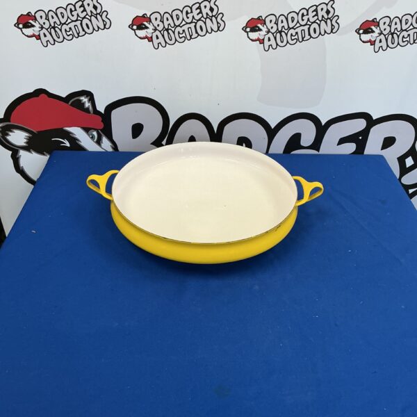 Vibrant yellow Dansk Kobenstyle paella pan for cooking and collecting.