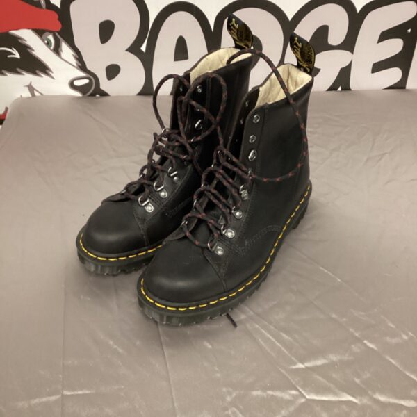 Black Doc Marten boots size 9, classic leather footwear.