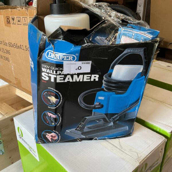 Side view of a Draper wallpaper steamer in its original packaging.