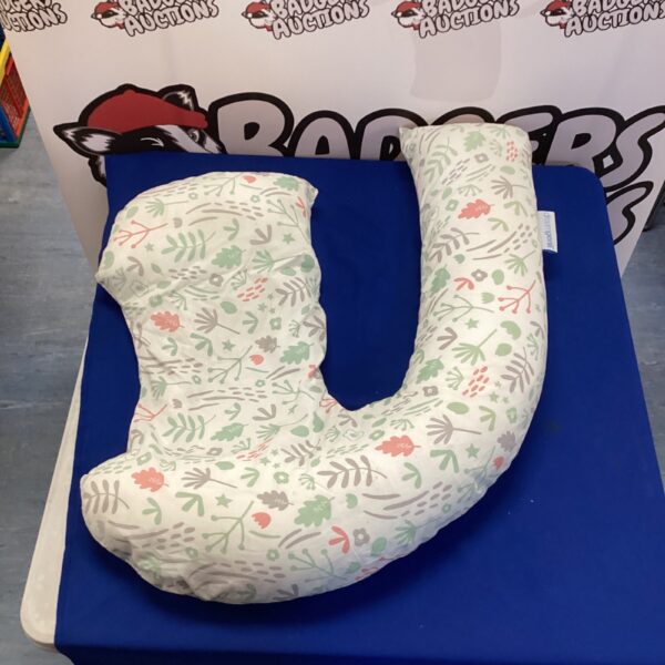 Floral Dream Genii nursing pillow for comfortable baby feeding.