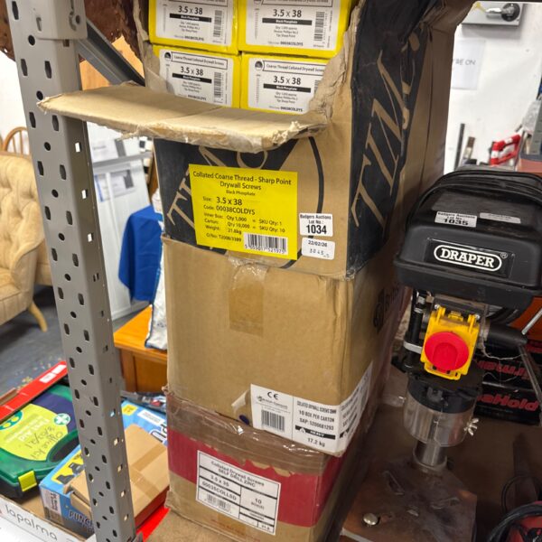 Three boxes of collated drywall screws for construction projects.