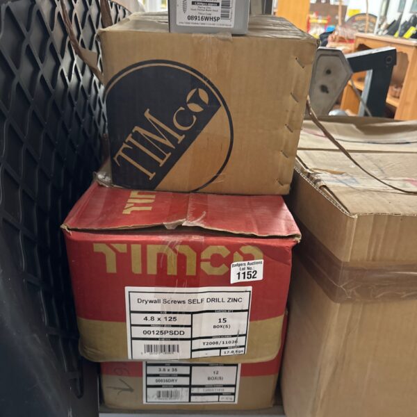 Wholesale lot of drywall and Phillips screws for construction projects.