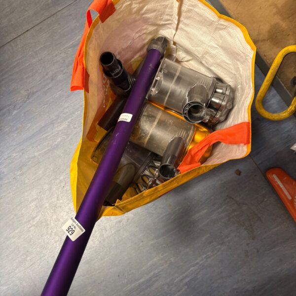 Bag of Dyson cordless hoover parts for repair.