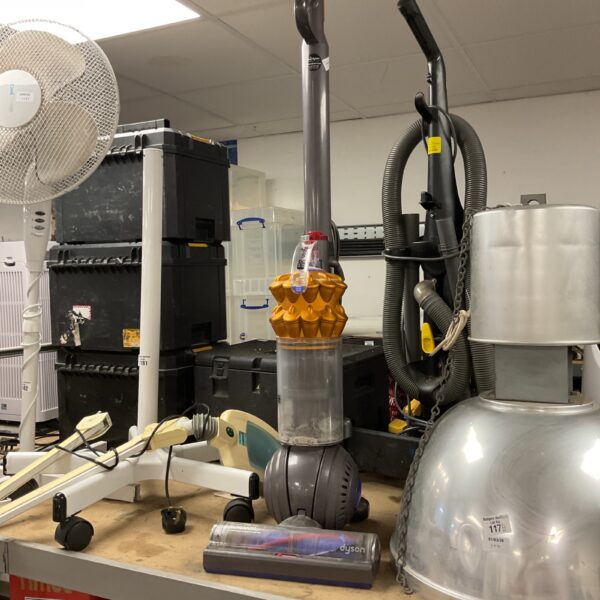 Side view of a used Dyson DC50 Hoover vacuum cleaner.