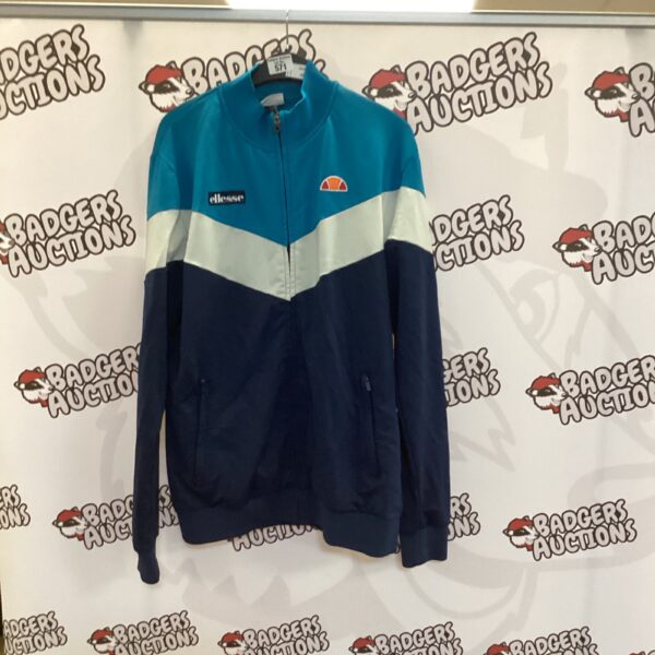 Vintage Ellesse tracksuit top, 1980s sportswear, colour block design.