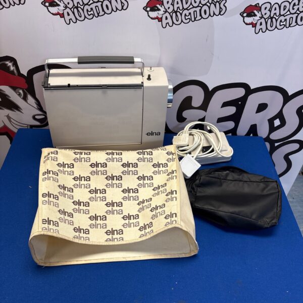 Vintage Elna Lotus SP portable sewing machine in good condition.