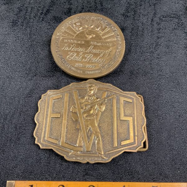 Vintage brass Elvis Presley belt buckle with portrait.