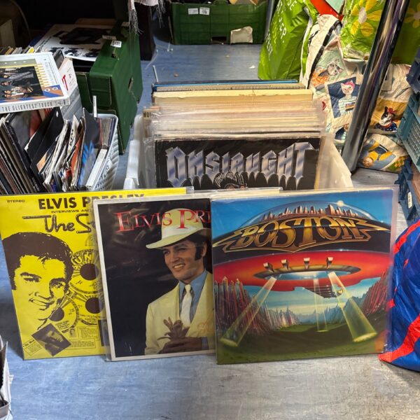 Lot of vintage Elvis Presley vinyl records for collectors.