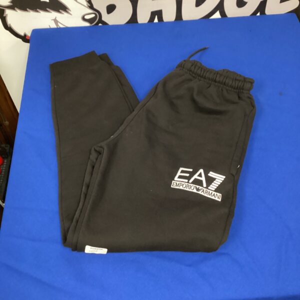 Emporio Armani EA7 tracksuit bottoms in size XL, black athletic wear.