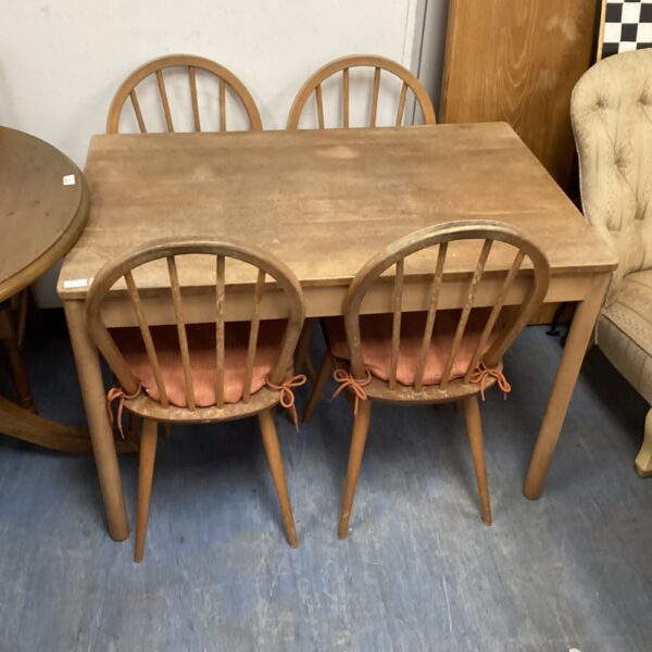 Vintage ercol dining table and four beechwood chairs set.