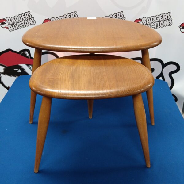 Vintage Ercol pebble tables, a nest of two mid-century modern tables.