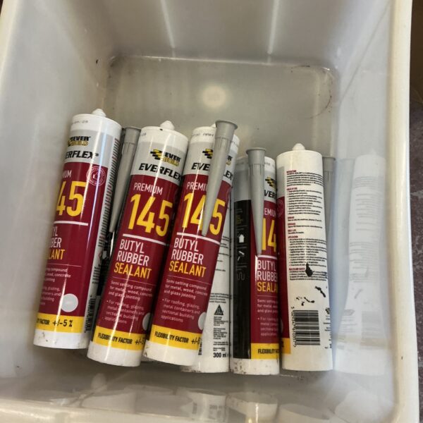 Eight tubes of Ever Build 145 butyl rubber sealant for construction and DIY.