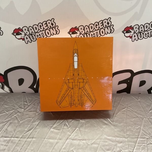 Orange F-14 Tomcat diecast model with Halloween theme.