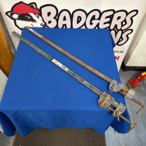 Two Faithfull 900mm metal sash clamps for woodworking projects.