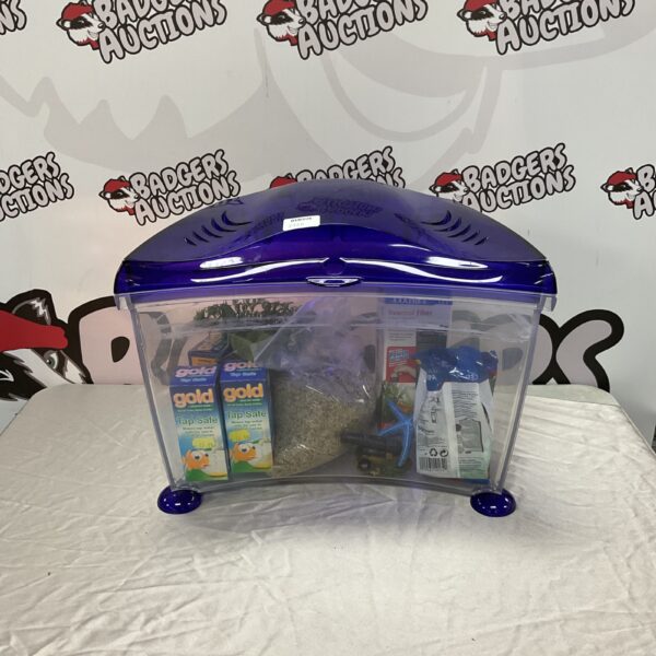 Plastic fish tank setup with filter, gravel, and water treatment.