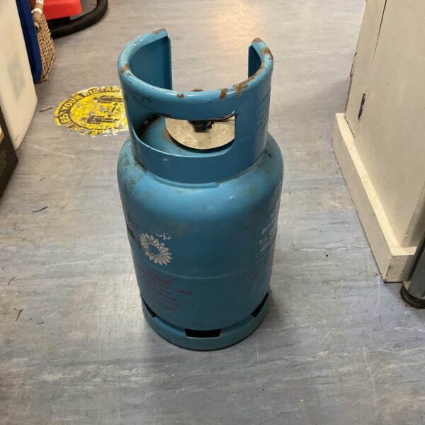 Flogas 15kg butane gas cylinder showing signs of wear.