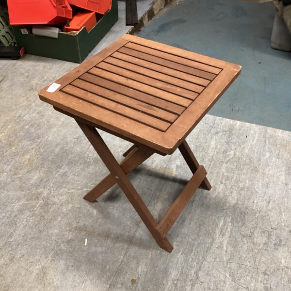 Small wooden folding garden table, ideal for outdoor use.
