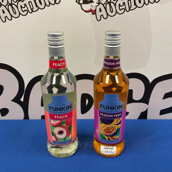 Sealed bottle of Funkin peach liqueur for cocktails.