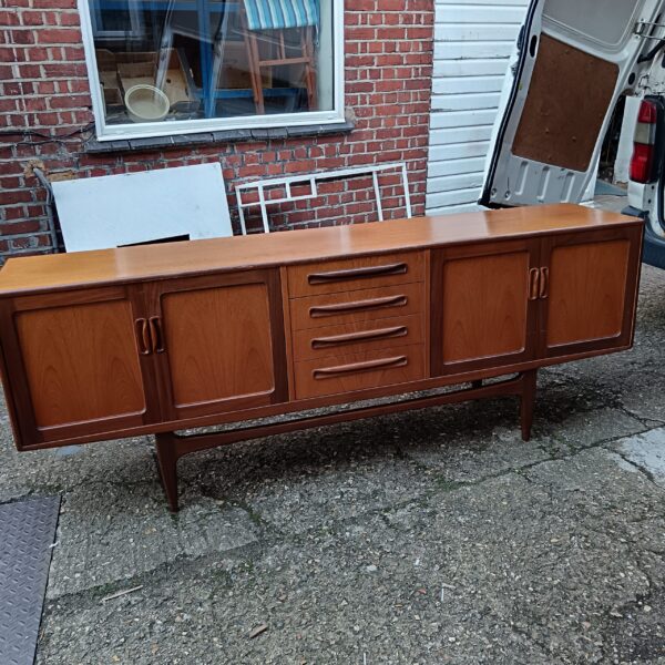 Large teak G-Plan sideboard cabinet with drawers and cupboards.