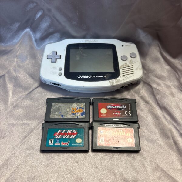 White Nintendo Game Boy Advance AGS-101 handheld console for retro gaming.