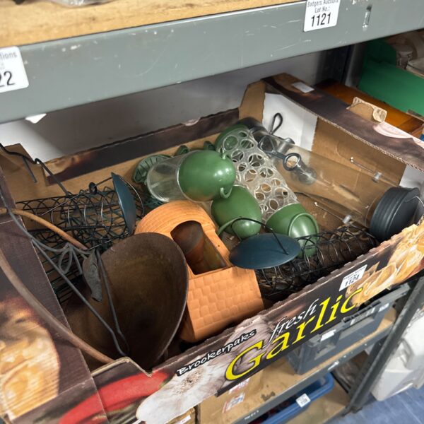Selection of colourful garden bird feeders for wild birds.