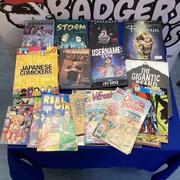 Diverse collection of graphic novels and manga books for collectors.