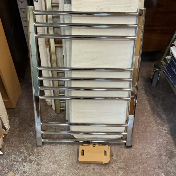 Chrome ladder radiator by Grava Haus for bathroom heating.