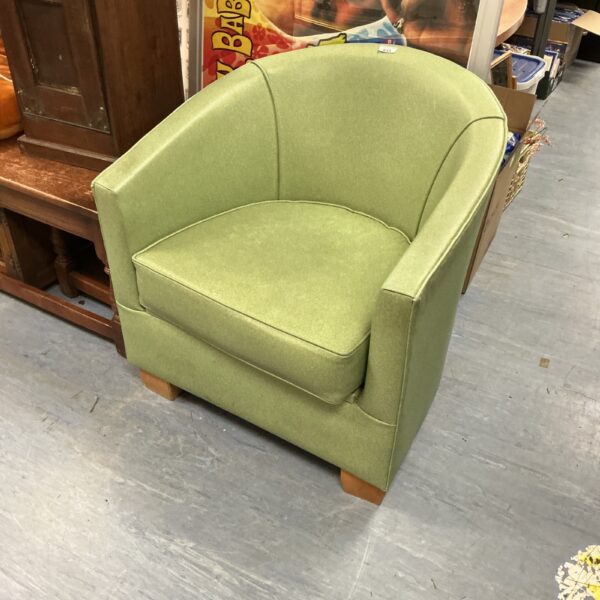 Vibrant green Cannes style tub chair, vintage mid-century seating.
