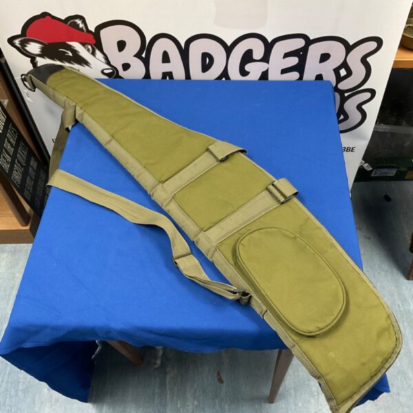 Vintage green canvas rifle slip case for gun storage.