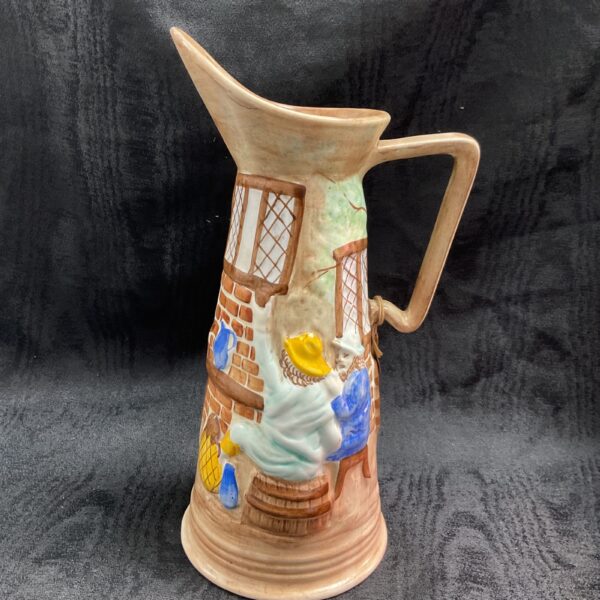 Vintage H J Wood Ltd jug with tavern scene relief moulding.