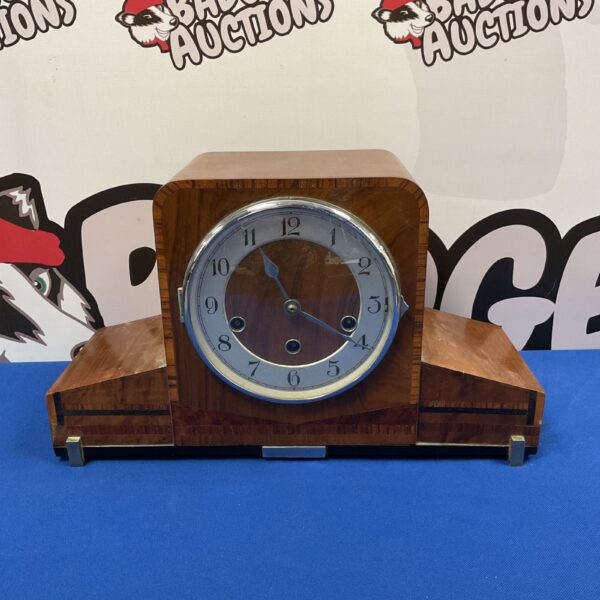 Vintage Haller Art Deco mantle clock with pendulum.