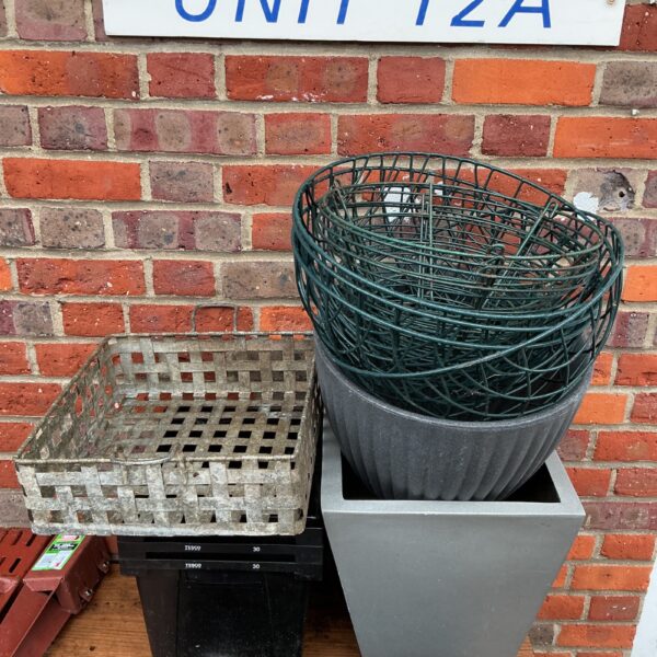 Hanging baskets and planters set for garden decoration.