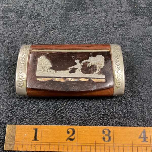 Vintage hardwood trinket box with white metal inlay detail.