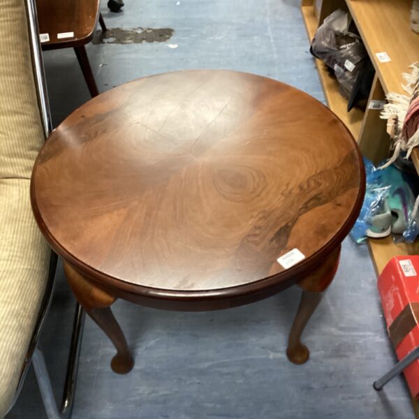 Vintage Harrod oak coffee table with curved legs.