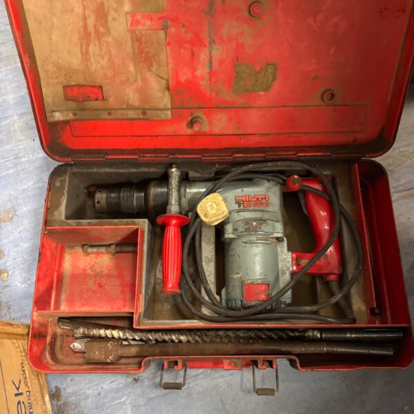 Used Hilti TE60 SDS drill in original case, construction tool.